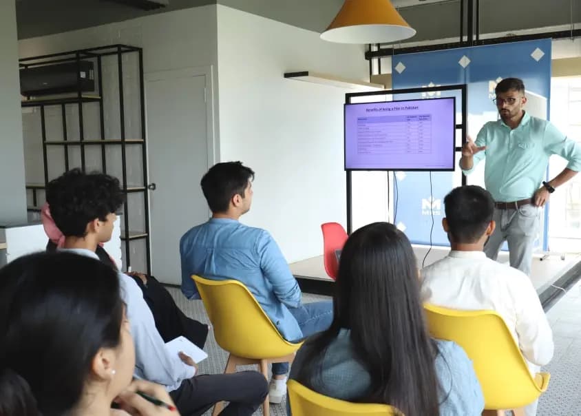 Uzair Alvi (Head of Finance) is giving a session on Tax filing - MRS Summers Internship Program | MRS Technologies Pakistan