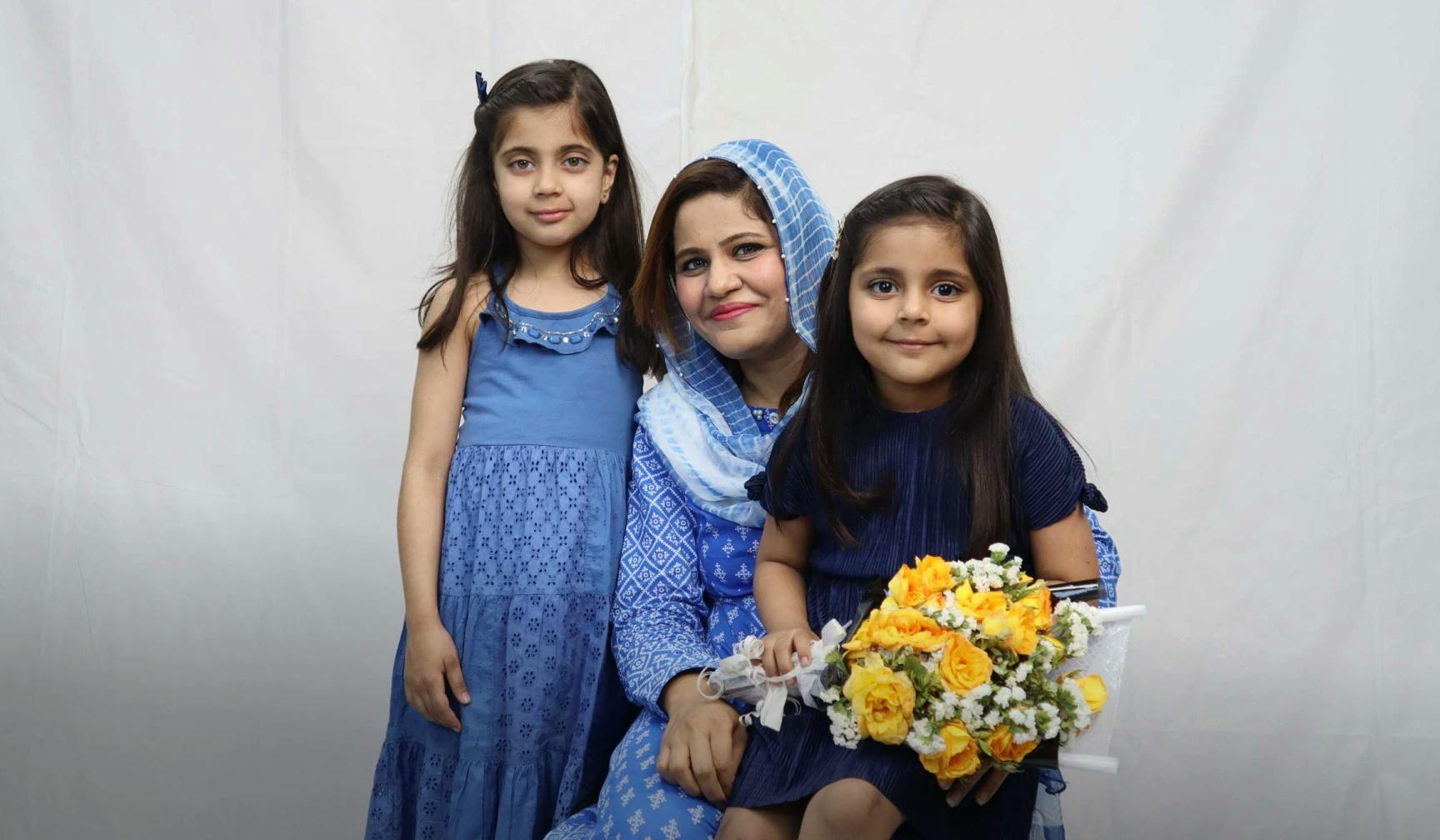 Somia, an employee at MRS with her kids on International Women's Day | MRS Technologies Pakistan