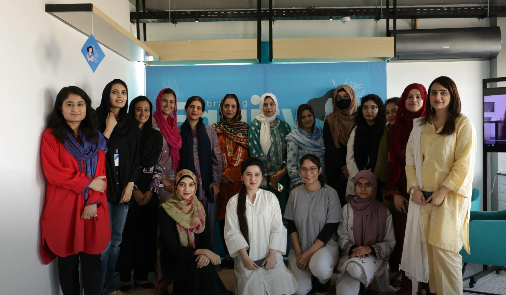 Female Staff at MRS Technologies posing for a group photo on International Women's Day | MRS Technologies Pakistan