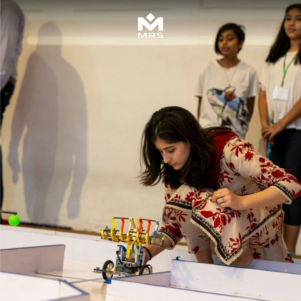 Competitor testing her robot before the Line following robot competition | NERC 2023 | MRS Technologies